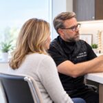 Dr. Bonner reviewing lumbar MRI with patient during regenerative spine consultation at ProForm MD